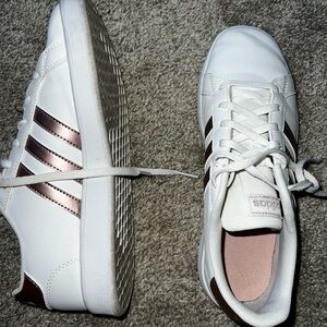 Girls or women’s Adidas Grand Court rose gold sneakers